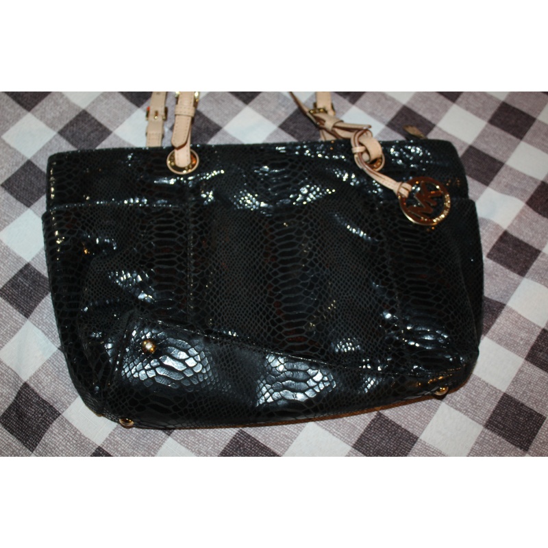 MICHAEL KORS BLACK AND TAN PURSE