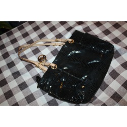 MICHAEL KORS BLACK AND TAN PURSE