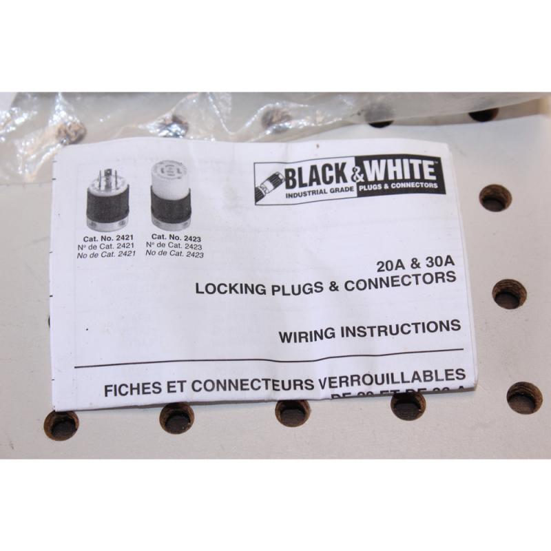 Black-and-white industrial grade twist lock plug end