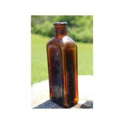 7" Vintage Clovers Imperial mange medicine bottle - Brown Glass