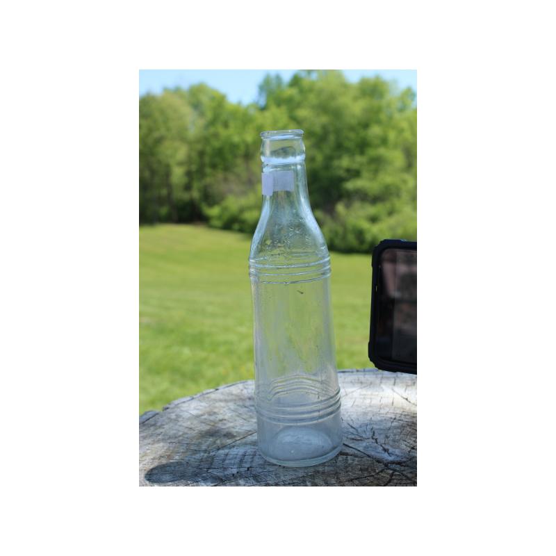 8" Vintage Conserve company bottle - Clear Glass
