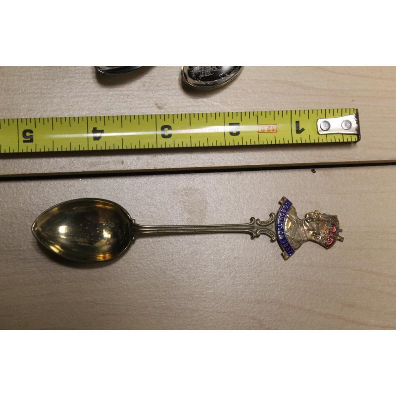 Set of FIVE nickel silver souvenir spoons