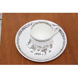 BLACK AND WHITE TEA CUP AND SAUCER