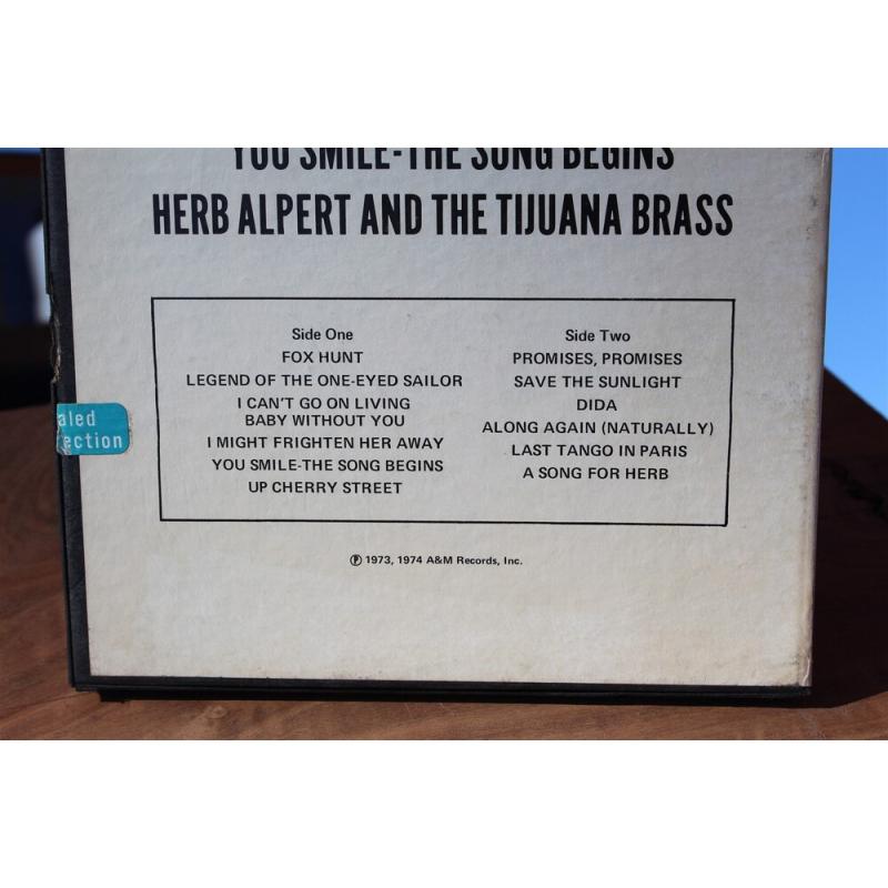 Reel to Reel Herb Alpert and the Tijuana brass band you smile the song begins